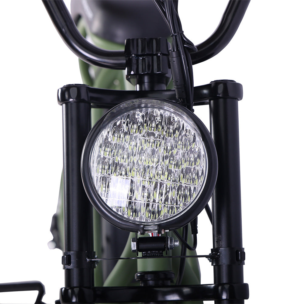 Close-up view of the front headlight on the Tracer Verge electric fat tire bike, showcasing the powerful illumination and robust frame design, by Chico Bikes.