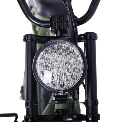 Close-up view of the front headlight on the Tracer Verge electric fat tire bike, showcasing the powerful illumination and robust frame design, by Chico Bikes.