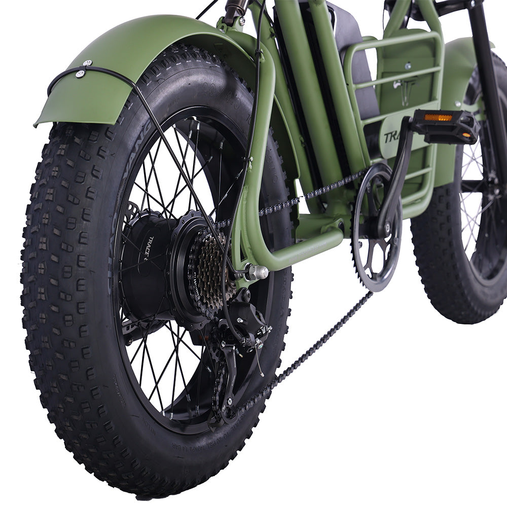 Close-up view of the rear wheel and drivetrain of the Tracer Verge electric fat tire bike, highlighting the 20"x4.0 tire and motor assembly for rugged performance, by Chico Bikes.